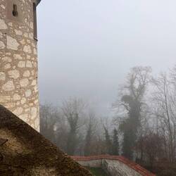 Look carefully for train rail line. The station is overlooked by Schloss Laufen