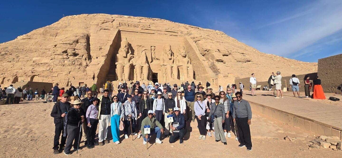 Uniworld River Tosca group photo in front of the temple