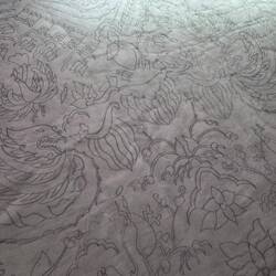 Design drawn onto fabric with pencil ready for wax to be applied by hand.