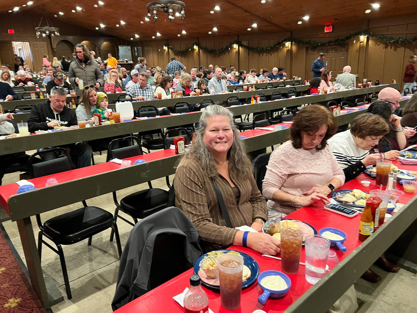 Rosanne at our table with our meal.