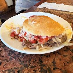 Gigundo beef Churrasco sandwich with the works. This is HALF a sandwich that needed a fork!
