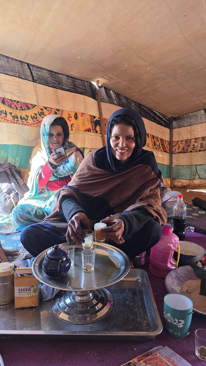 Lidya cooking tea for us.