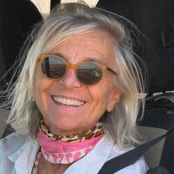 Elfi after having mastered the steepest and most difficult pass road I have ever seen. What a hero!