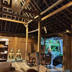 The small cafe in a traditional wooden building next to the home stay