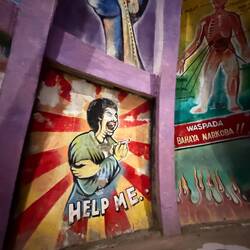 Murals inside the church depict many of the personal issues faced by people, including addiction