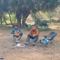 Next morning. Breakfast is smokes for Nick, baked beans outta can for IronChris. RidingKismet: no.