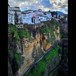 View from New Bridge to our hotel on the cliff (our room circled in red)