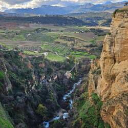 Back in Ronda, view from New Bridge down gorge to valley and mountains