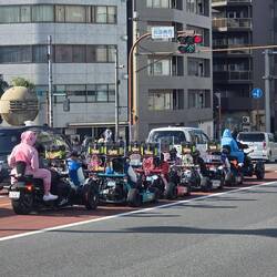 Mario cart riders in downtown Tokyo
