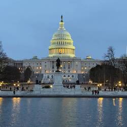 The US Capitol illuminated at night