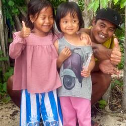 A family at Sire Beach.