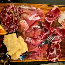 ​The Platter: Culatello di Zibello (left), Salame Felino, Prosciutto, Coppa and Parmigiano.