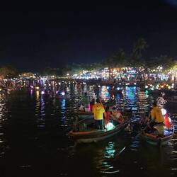 These lit up lantern boats are magical