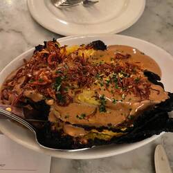 Grilled cabbage wit porcini hazelnut flavor hollandaise