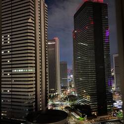 View from our hotel room as surrounding buildings light up