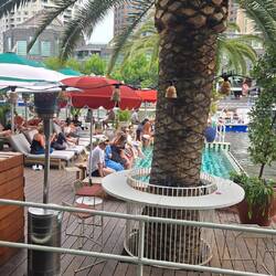 This is a floating bar on the river that was designed to look like a cruise ship.