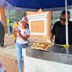 Hot arepas cooked to order—simple, filling, and part of everyday Cartagena street life.