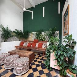Once-ruined colonial buildings restored into hotels during Cartagena’s early-2000s revival.