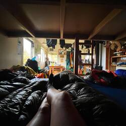 Relaxing in maybe a smelling hut