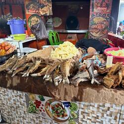 Fresh fish fried on site and served hot.