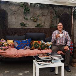 Mui enjoying a double espresso in the courtyard of Musée Barbier-Mueller — Geneva, Switzerland.