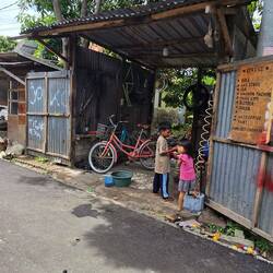 You never see a workbench here. Everyone squats of the ground to work.