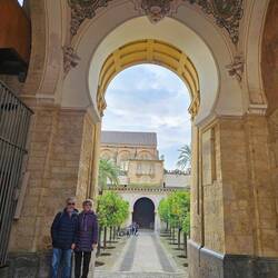 Charlie and me at entrance to Mezquita courtyard