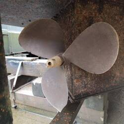 Rainboat's old propeller with the dink in it