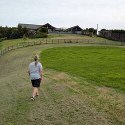 Exploring Katja and Steve's property. Their house at the top of the hill.