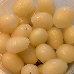 A bowl full of peeled rambutans. Asian love language.