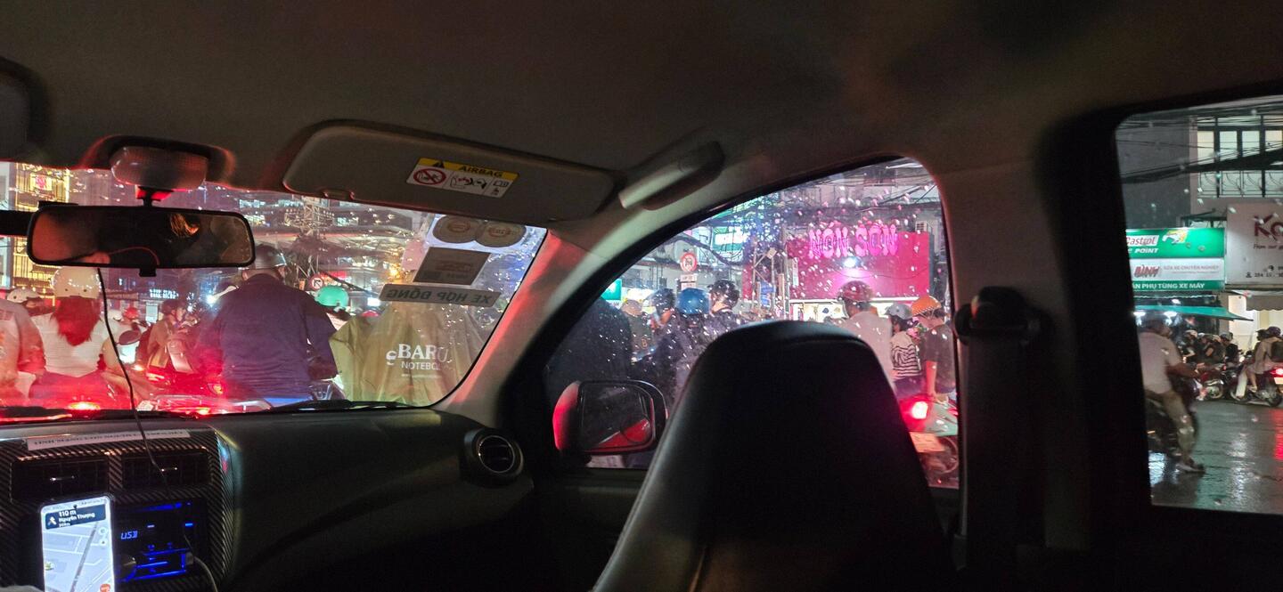 Traffic all around our Grab taxi