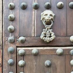 Ornate bronze door knockers once signaled family status and wealth in San Diego.