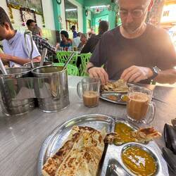 My v. fav thing - roti canai (Indian bread and curry dips) and teh tarik (sweet tea) for breakfast