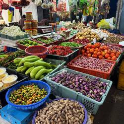 Row upon row of brightly coloured, textured fruit and vegetables piqued our curiosity.