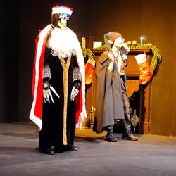 Death and Albert dressed as the Hogfather and an Elf