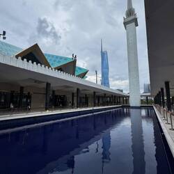 The National Mosque's minaret mirrors the Merdeka 118 tower.