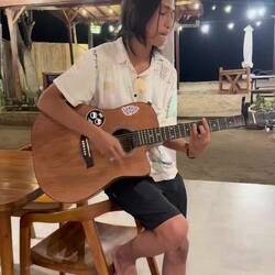 Egy, our lovely Barman plays us a song