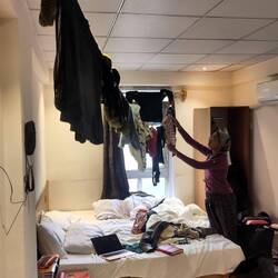 Doing home things in our hotel room. Always good to have some spare straps.