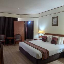 Our hotel in Chiang Mai is dated but roomy and functional. Right up in-law alley.