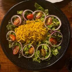 Trout with salad and green plantain