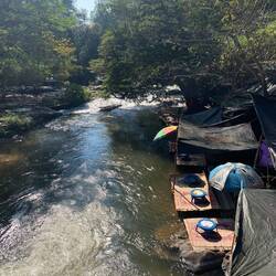 These decks are built out over the water for people to enjoy a picnic!
