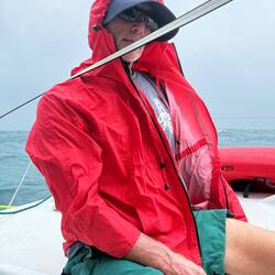 Dressing for the conditions. The strap is the jack (safety) line that we clip our harnesses to.