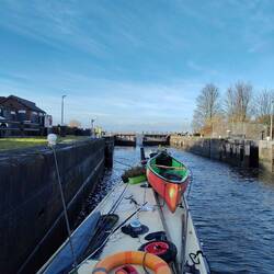 One gate was opened manually so narrowboats could enter and exit.
