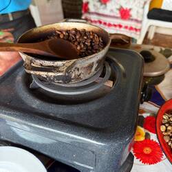 Warming up beans before grinding
