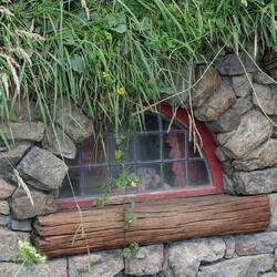 Again the detail with flowers in the window.