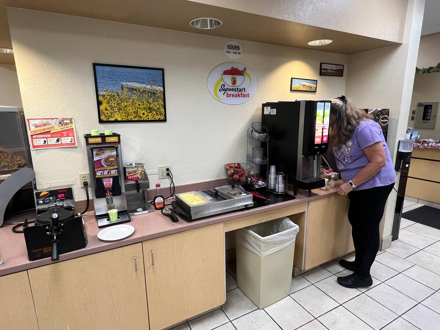 Rosanne getting her breakfast at the Super 8