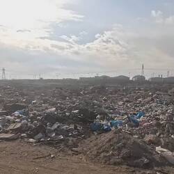 Riding south. Unfortunately, loads of trash and smoke is most normal along the big roads.