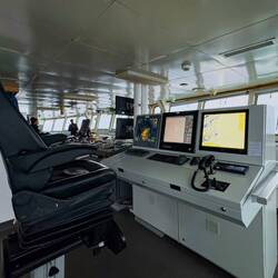 The bridge is quiet at this hour with the passengers at dinner — Aboard Ortelius.