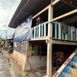 Such a basic dwelling, but look at the beautifully tiled stairs!