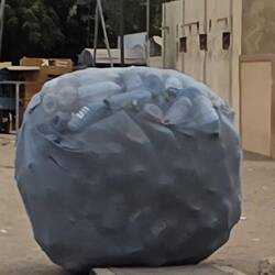 That's not a water melon, it's a huge ball of plastic bottles!